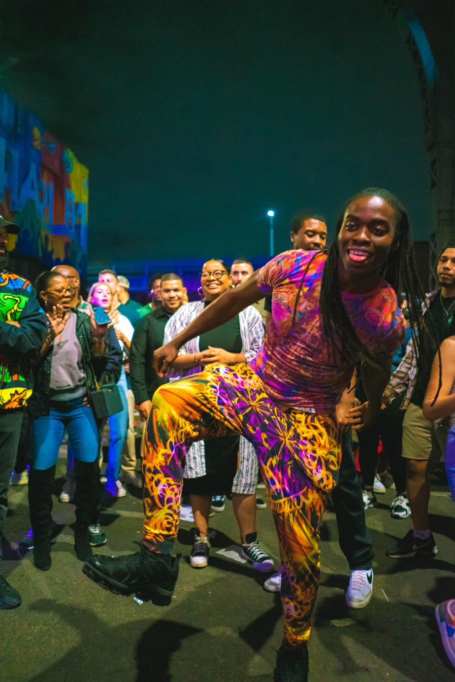 Performers in colorful dress at the market