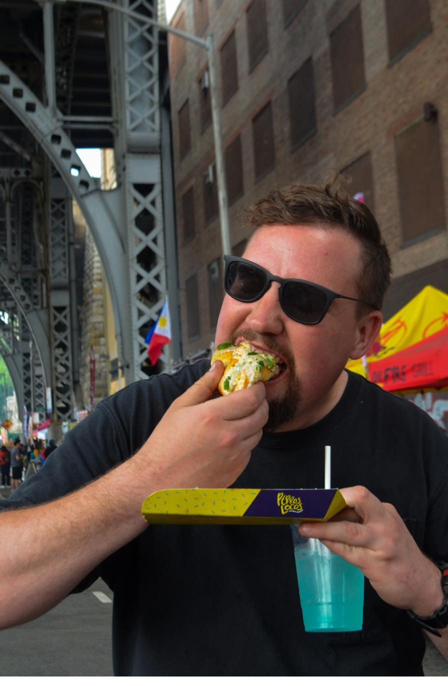 Guest with a taco in hand